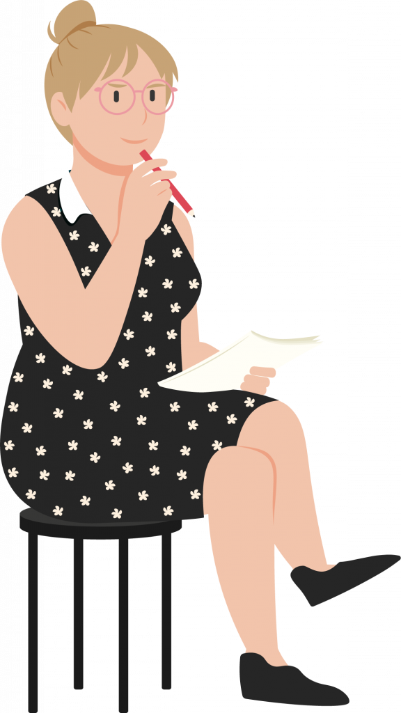 Naispuolinen luova agentti istuu mekko päällä tuolilla, kynä kädessä ja näyttää mietteliäältä